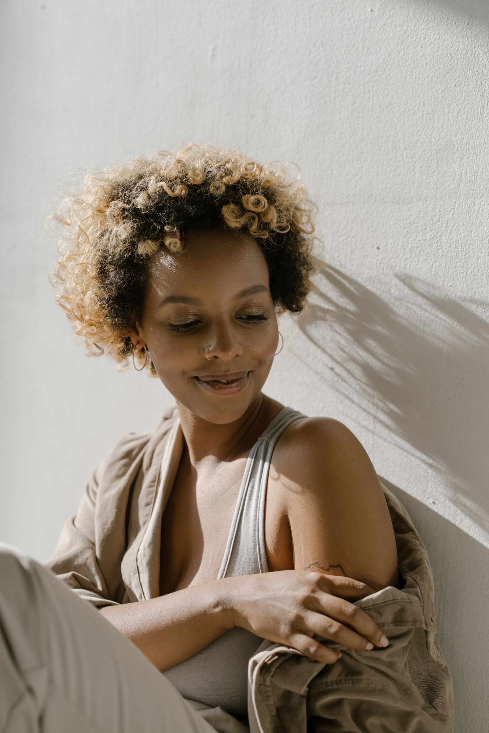 A woman at ease in warm light
